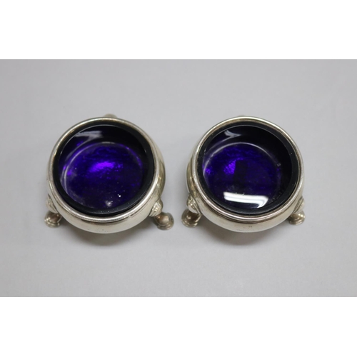 1178 - Pair of antique 18th century hallmarked sterling silver salts with blue glass liner, London, total a... 