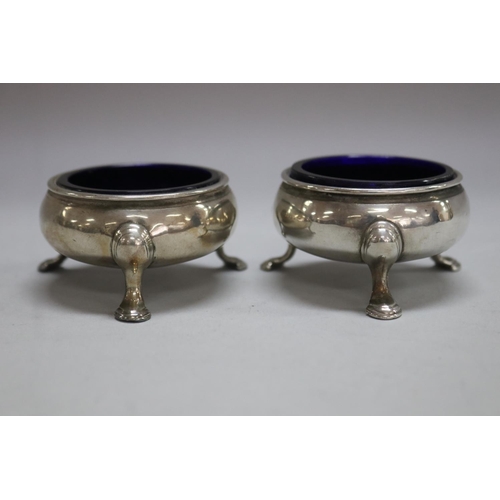 1178 - Pair of antique 18th century hallmarked sterling silver salts with blue glass liner, London, total a... 