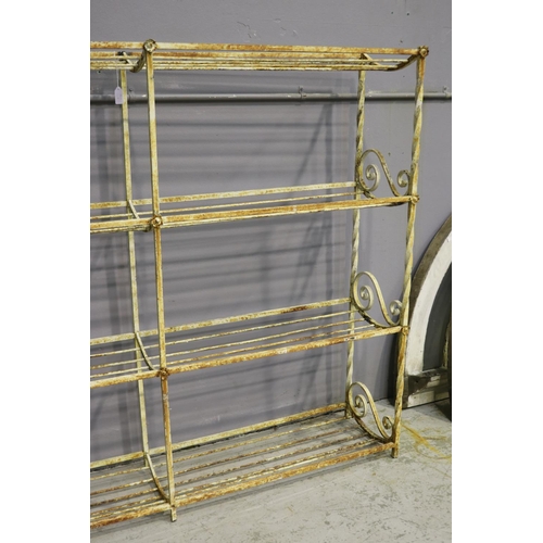 1065 - French wrought iron multi tiered rack, with scrolling ends, approx 171cm L x 36.5cm W x 142cm H