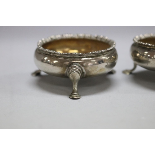 1179 - Pair of antique English hallmarked sterling silver salts, total approx 95 grams and 7cm Dia x 3cm H ... 