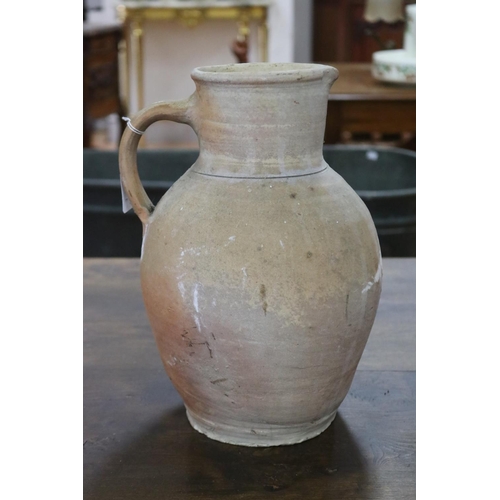 1314 - French stoneware jug with single handle, approx 31cm H x 23cm W x 21cm D (excluding handle)