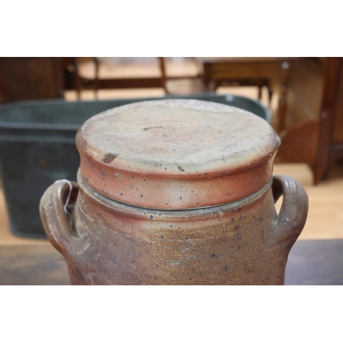 1317 - French twin handled lidded stoneware confit pot, approx 40cm H x 30cm W x 26cm D (including handles ... 