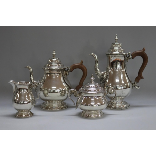 1263 - Four piece sterling silver coffee and tea service to include coffee pot, teapot, sugar and cream, by... 