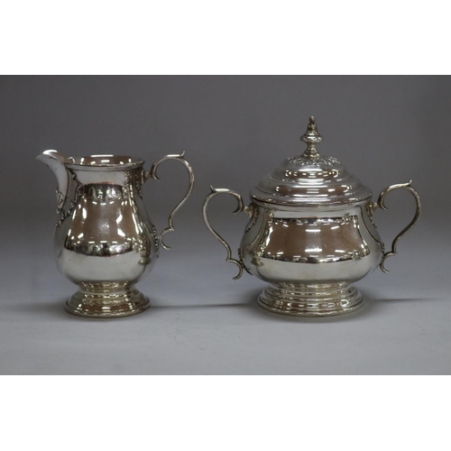 1263 - Four piece sterling silver coffee and tea service to include coffee pot, teapot, sugar and cream, by... 