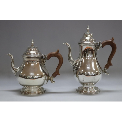 1263 - Four piece sterling silver coffee and tea service to include coffee pot, teapot, sugar and cream, by... 