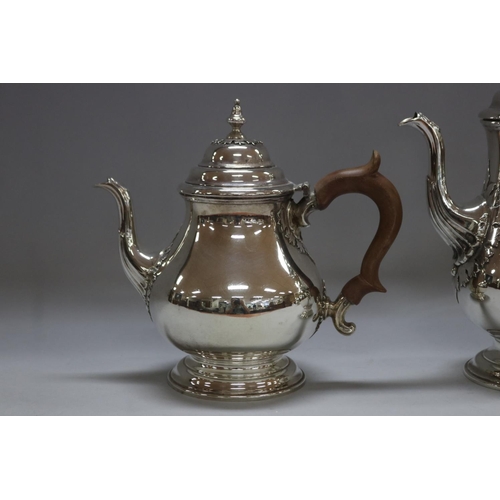 1263 - Four piece sterling silver coffee and tea service to include coffee pot, teapot, sugar and cream, by... 