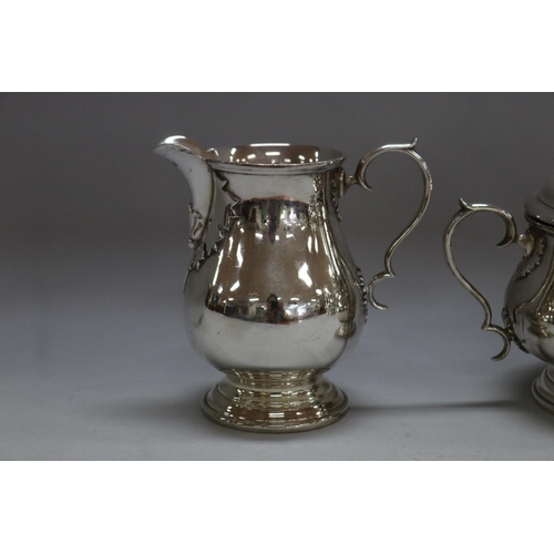 1263 - Four piece sterling silver coffee and tea service to include coffee pot, teapot, sugar and cream, by... 