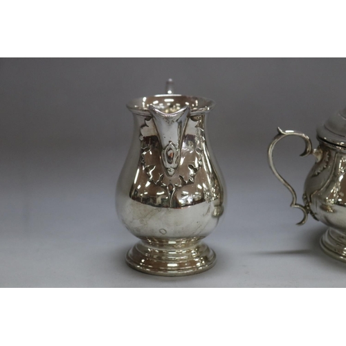 1263 - Four piece sterling silver coffee and tea service to include coffee pot, teapot, sugar and cream, by... 