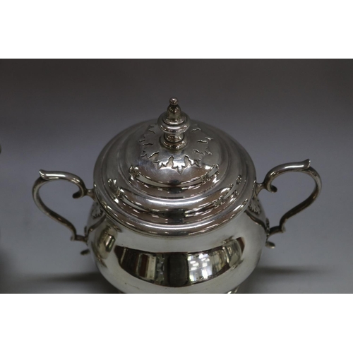 1263 - Four piece sterling silver coffee and tea service to include coffee pot, teapot, sugar and cream, by... 