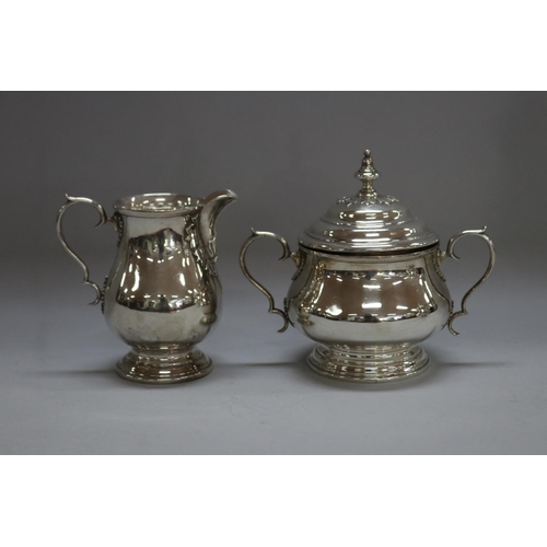 1263 - Four piece sterling silver coffee and tea service to include coffee pot, teapot, sugar and cream, by... 