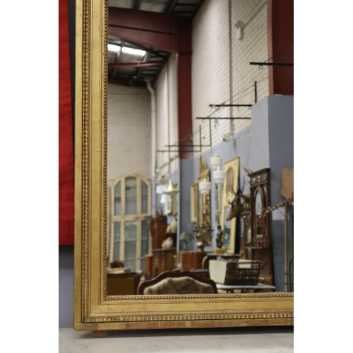 1058 - Antique French gilt salon mirror, with central laurel crest, quiver & torche, approx 183cm x 97cm