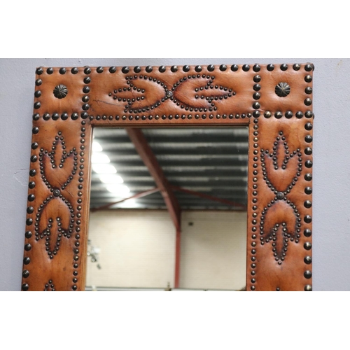 1336 - Unusual pressed leather wall mirror with studs, approx 90cm H x 61cm W