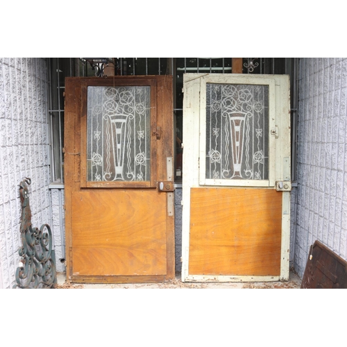 427 - Pair of antique French Art Deco period entry doors, with wrought iron panels, circa 1920's  each app... 