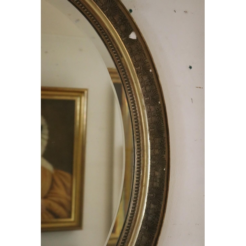 1095 - Antique French Louis XV style gilt framed oval wall mirror with C scroll crest to top, approx 122cm ... 