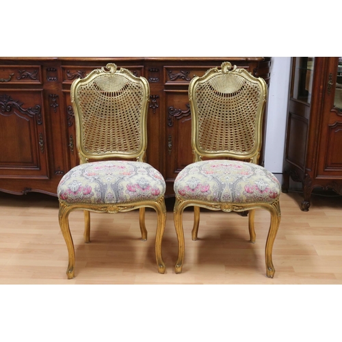 1277 - Pair of French Louis XV style gilt upholstered chairs, with ornate rattan backs, each approx 104cm H... 