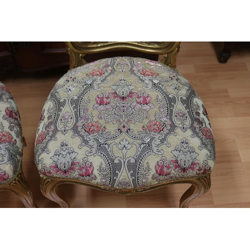 1277 - Pair of French Louis XV style gilt upholstered chairs, with ornate rattan backs, each approx 104cm H... 