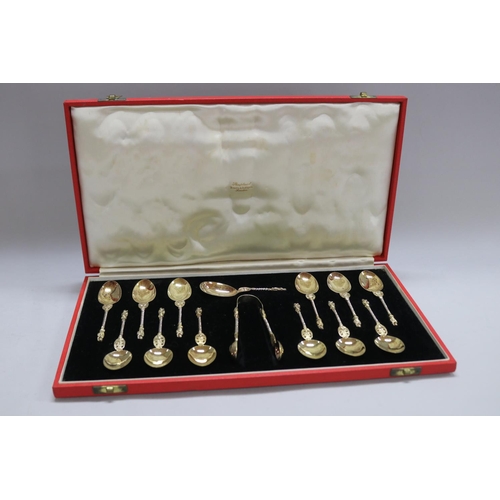 1266 - Cased thirteen Victorian hallmarked sterling silver apostle spoons along with a pair of tongs, Londo... 