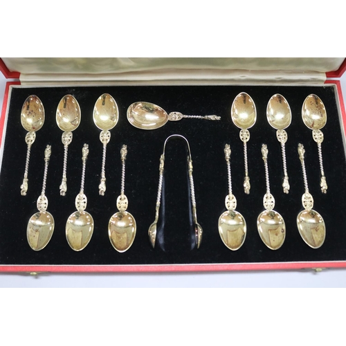 1266 - Cased thirteen Victorian hallmarked sterling silver apostle spoons along with a pair of tongs, Londo... 