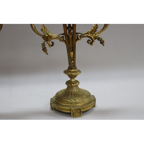 1326 - Pair of antique French Louis XVI revival bronze two stick candelabra, each with central flaming torc... 