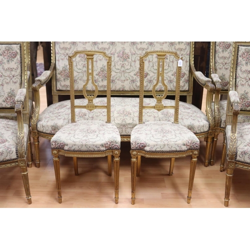 1038 - Antique French gilt wood Louis XVI style salon suite, comprising settee, four generous arm chairs & ... 