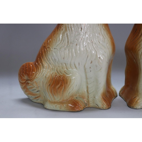 1410 - Pair of Staffordshire dogs with glass eyes, each approx 28cm H x 24cm W x 12cm D (2)
