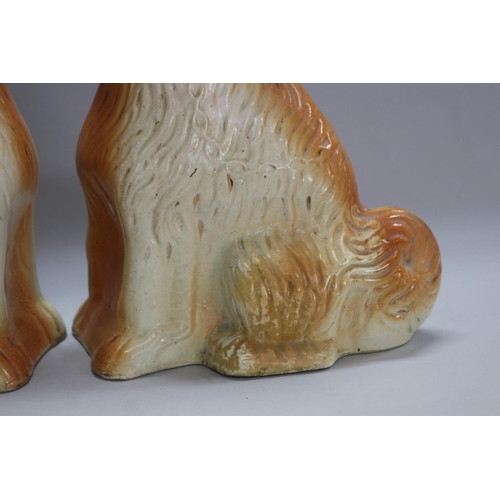 1410 - Pair of Staffordshire dogs with glass eyes, each approx 28cm H x 24cm W x 12cm D (2)