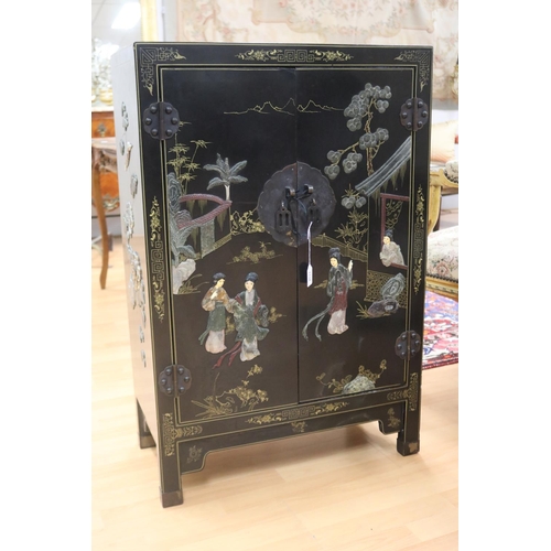 1134 - Chinese black lacquer two door side cabinet, decorated with hardstone scene, approx 62cm L x 31cm W ... 