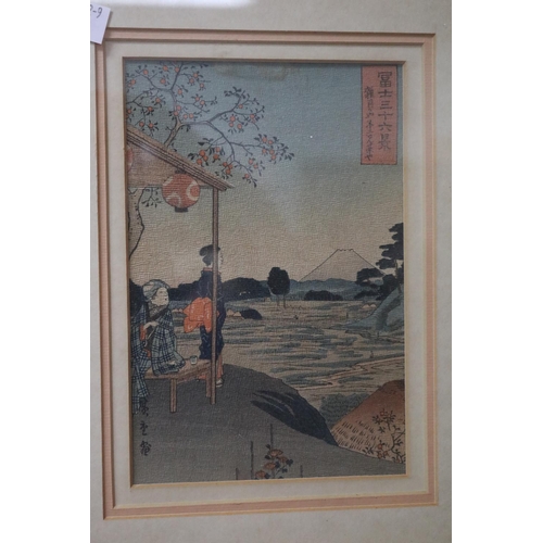 1199 - Three Japanese coloured woodblock print, approx 33cm x 26.5cm and smaller (including frame) and 22cm... 