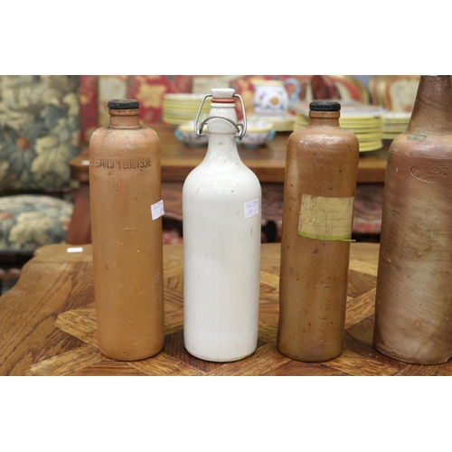 1337 - Lot of five stoneware bottles, approx 34cm H & smaller (5)
