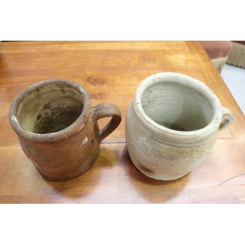 1338 - Two French stoneware confit pots, approx 16cm H x 18cm dia (excluding handle) & smaller (2)