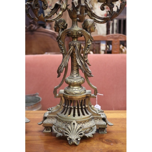 1094 - Impressive large antique French gilt bronze mantle clock and pair of five stick candelabrum, all wit... 