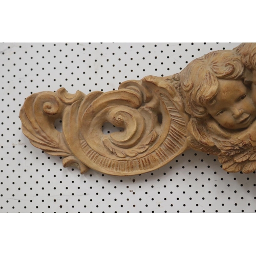 1115 - Long Italian putti wall plaque, terracotta painted finish, approx 95cm L x 32cm H x 17cm W