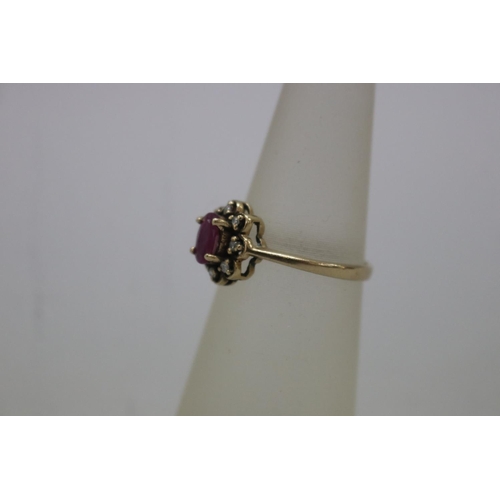 1122 - Diamond and ruby set 9ct gold ring, size H