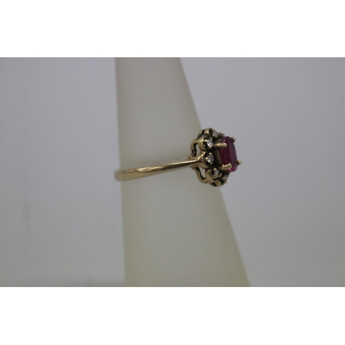 1122 - Diamond and ruby set 9ct gold ring, size H