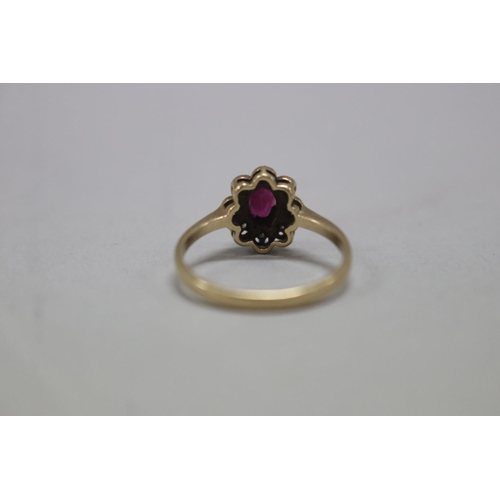 1122 - Diamond and ruby set 9ct gold ring, size H