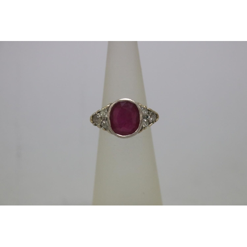 1128 - Diamond and ruby ring set with yellow and white gold, size H