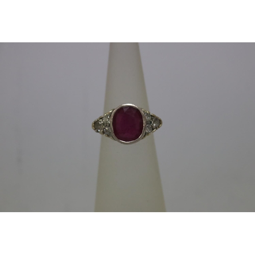 1128 - Diamond and ruby ring set with yellow and white gold, size H