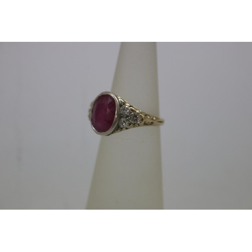 1128 - Diamond and ruby ring set with yellow and white gold, size H