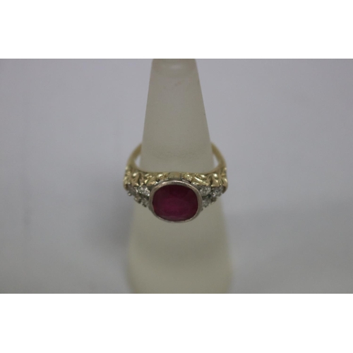 1128 - Diamond and ruby ring set with yellow and white gold, size H