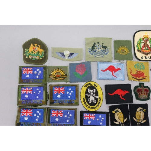 63 - Lot of about 37 Australian army, etc., cloth insignia. Excellent condition