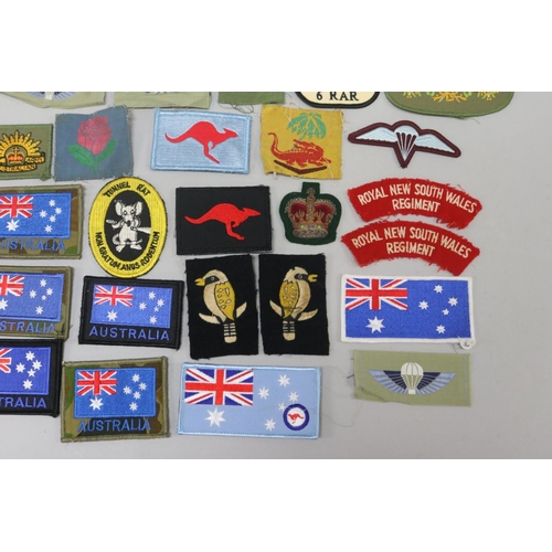 63 - Lot of about 37 Australian army, etc., cloth insignia. Excellent condition