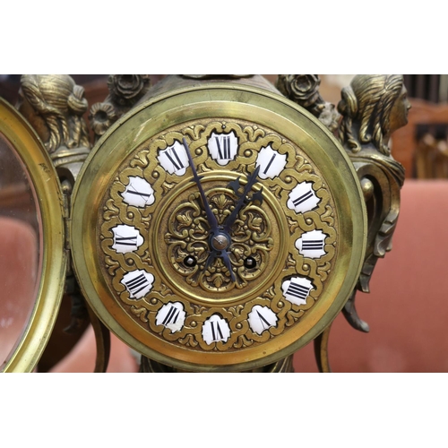 1051 - Impressive large antique French gilt bronze mantle clock and pair of five stick candelabrum, all wit... 