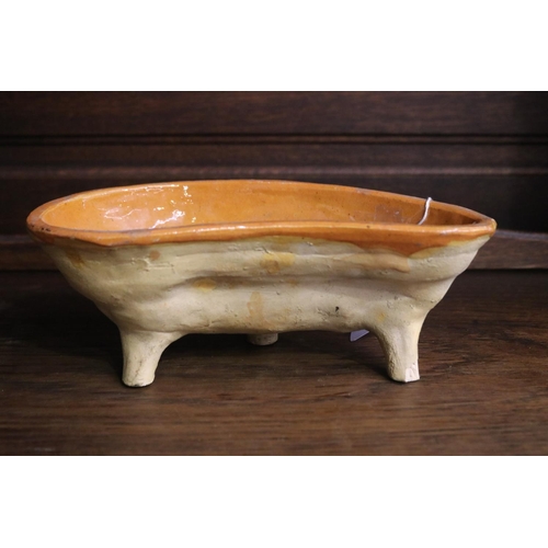 1084 - Antique French pottery lamb mould, glazed inner, standing on peg feet, approx 10cm H x 25cm L x 14cm... 