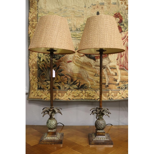 1118 - Pair of brass pineapple based column lamps, with woven fiber shades to match, in working condition a... 