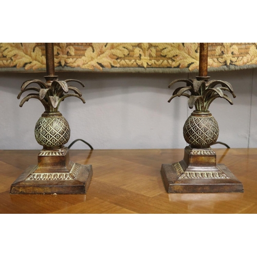 1118 - Pair of brass pineapple based column lamps, with woven fiber shades to match, in working condition a... 