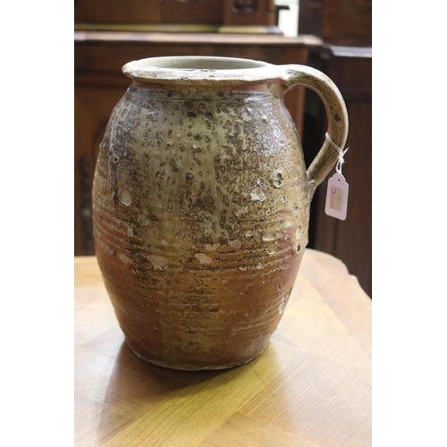 1128 - Antique glazed pottery vessel, loop handle, approx 28cm H x 21cm Dia (excluding handle)