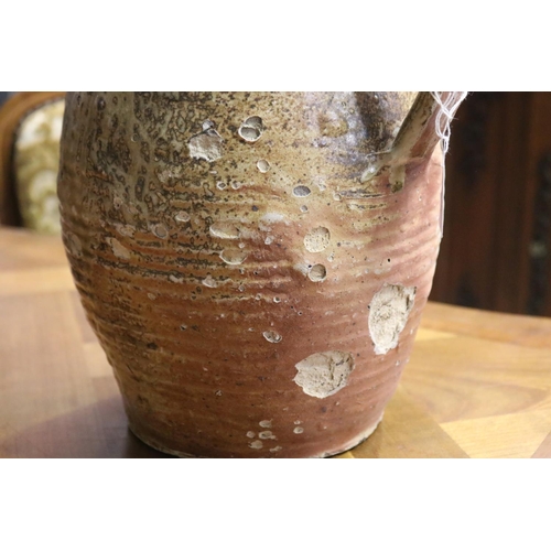 1128 - Antique glazed pottery vessel, loop handle, approx 28cm H x 21cm Dia (excluding handle)