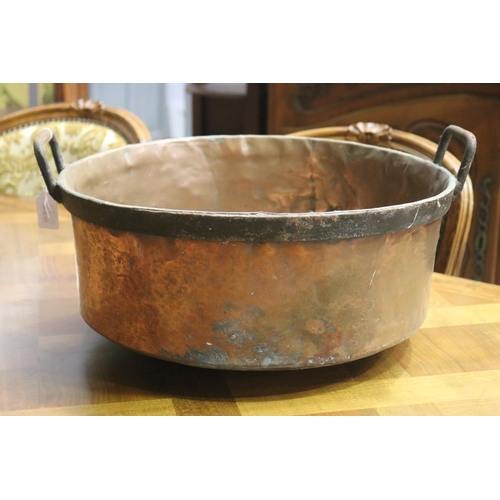 1129 - Large French copper and wrought iron banded rim twin handled pan, approx 19cm H x 43cm Dia (excludin... 