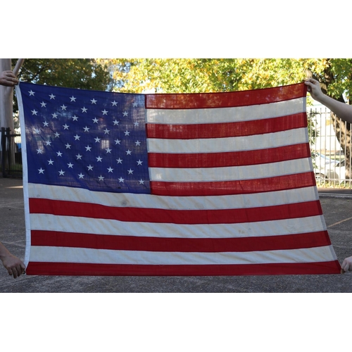 1131 - Vintage American flag. Purchased in Southampton, New York, approx 120cm H x 200cm L