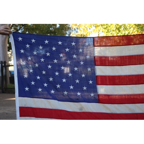 1131 - Vintage American flag. Purchased in Southampton, New York, approx 120cm H x 200cm L
